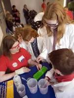 Student demonstrators and children enjoy the Science Festival events at the National Museum","caption